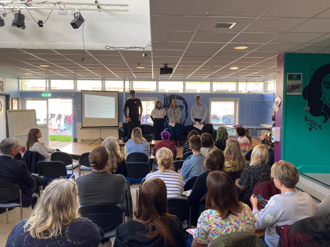 Left to right.
DMYP Otto, DMYP Meg, MYP Emiko, MYP Joe 
Giving our presentation at Tiverton Youth centre.