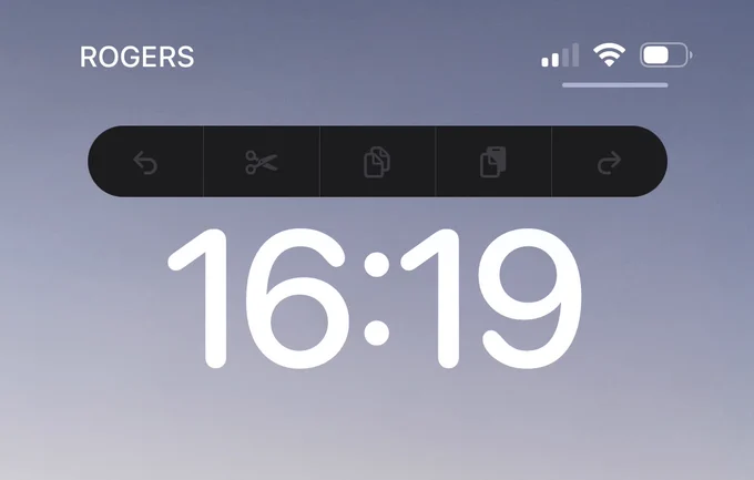 Above my Lock Screen clock is a bar with disabled icons for undo, cut, copy, paste, and redo. 