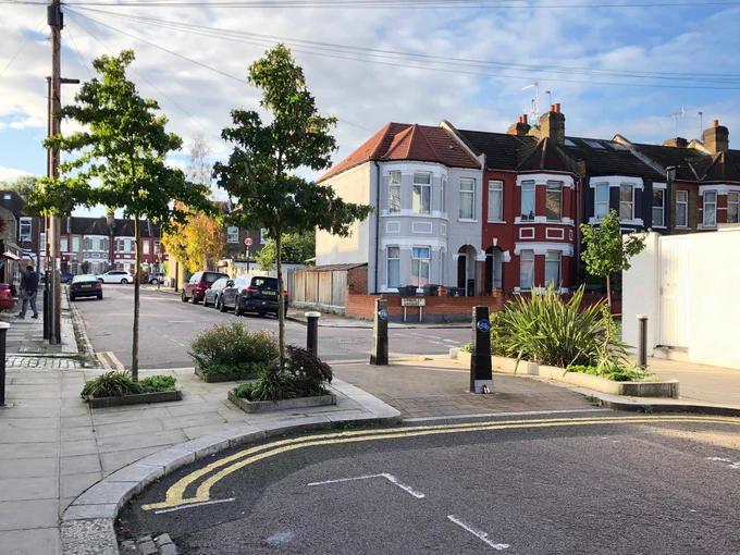 A permanent modal filter, with high quality materials and planting. Demountable bollards have been installed. Camera filters do not offer this opportunity.