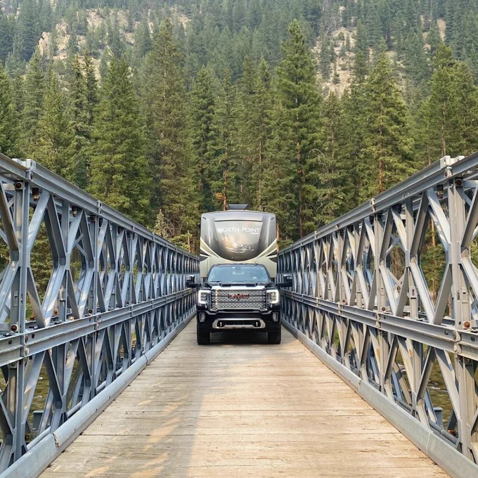 Image contains: Bridge, Building, Railing, Path