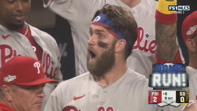 Bryce Harper with his jaw dropped after Kyle Schwarber hit a ball to the moon. Literally.