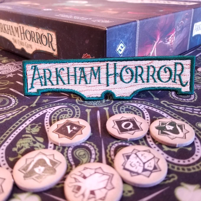 Arkham Horror embroidered patch.