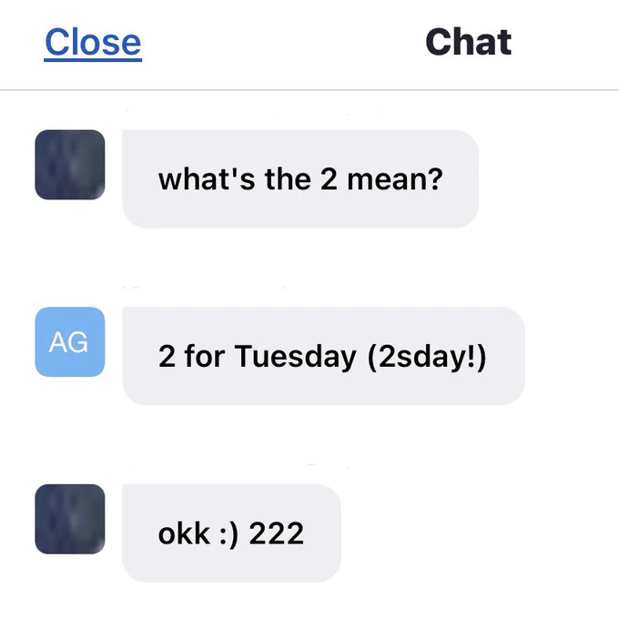 A screenshot of Zoom chat from the show. Someone asks, “what’s the 2 mean?” Another responds, “2 for Tuesday (2 plus day)!” The original asker responds, “ok smiley face 222”