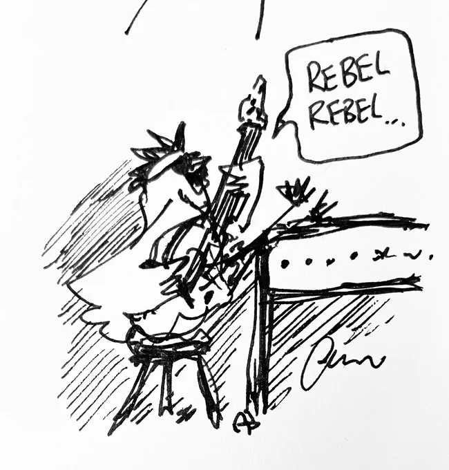 This is a Rebel Chicken singing Rebel Rebel with an electric guitar. 