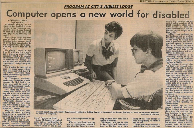 A newspaper article in the Prince George Citizen. An image of a woman helping a man in a wheelchair use a computer.