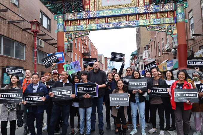 Me standing with small business owners and community members in Chinatown.