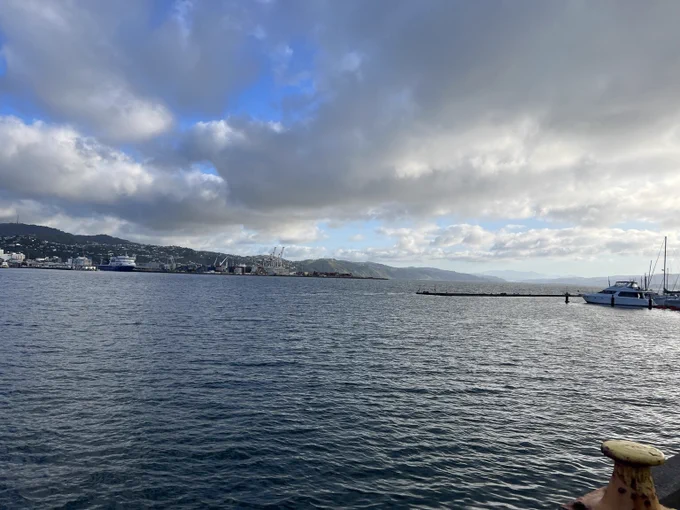 A view over Wellington harbor with a partly cloudy sky