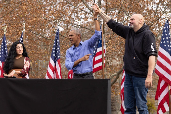 President Obama stands with John Fetterman, candidate for U.S. Senate, and Gisele Baretto Fetterman.
