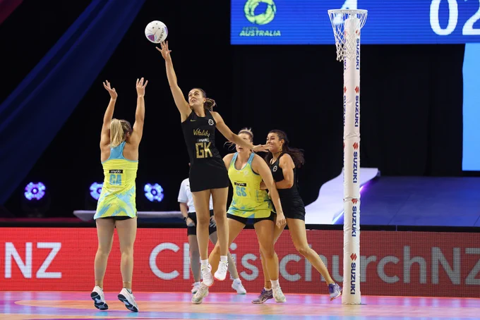 England defender Tash Pavelin stretches for a ball as her side play Australia in the Fast5 Netball World Series