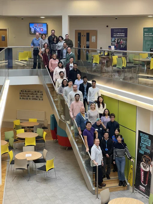 Challengers standing on the staircase at Coventry University Jaguar Building