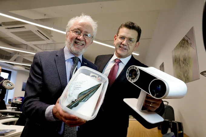 Minister of State for Heritage and Electoral Reform, Malcolm Noonan TD and CEO of The Discovery Programme Dr John O'Keefe with archaeological artefact and 3D scanner