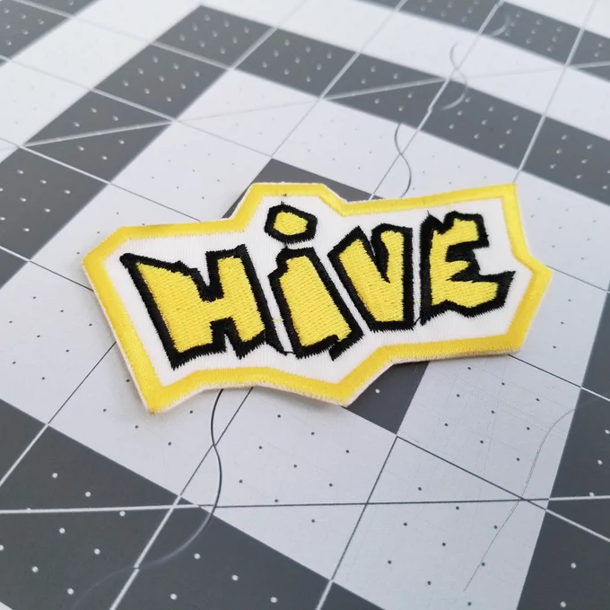 Embroidered patch for the abstract boardgame Hive.