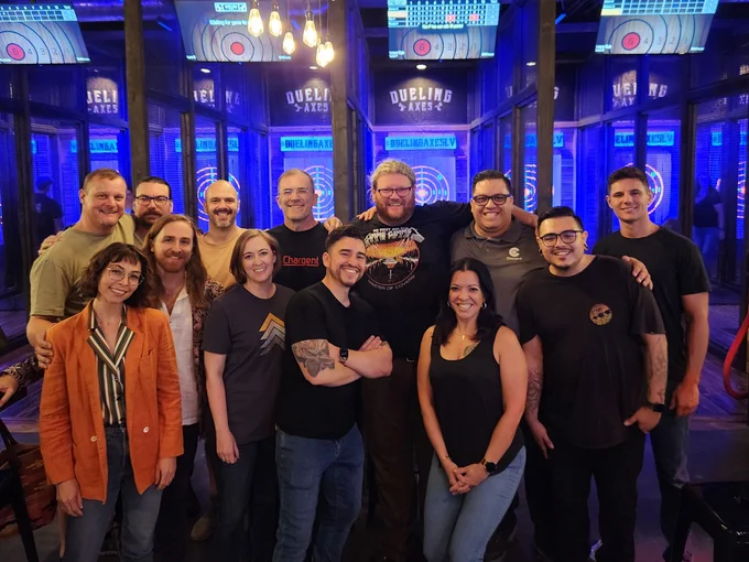 Chargent team together after a few rounds of axe throwing