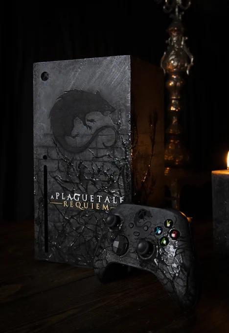 A custom console of A Plague Tale: Requiem with a custom controller.