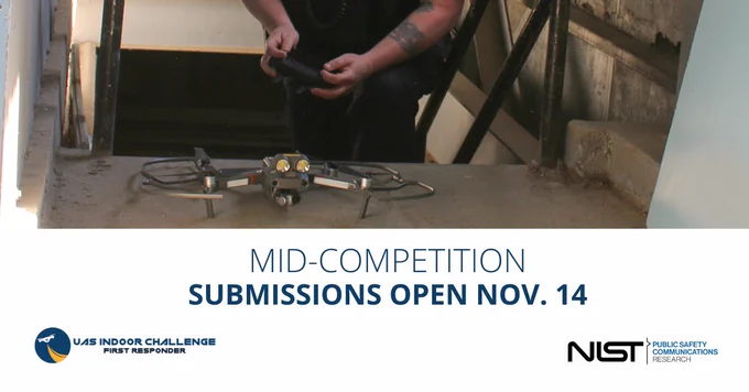 : Image of person holding drone controller with the drone on a table. Text reads, “Mid-competition submissions open Nov. 14 UAS Indoor Challenge First Responder NIST Public Safety Communications Research”.