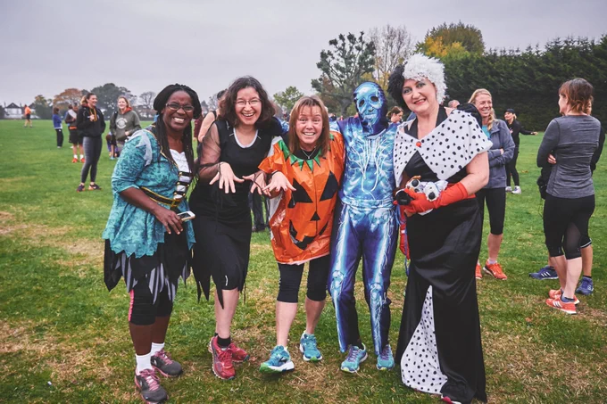 Participants at Gunnersbury parkrun wearing Halloween fancy dress 