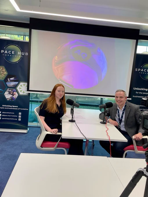Ava and Glenn sat across a table in the Space Hub Yorkshire space in Nexus, University of Leeds  - recording the first episode of a new podcast series.