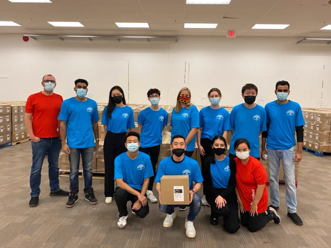 QuadReal interns in Toronto volunteering at Global Medic