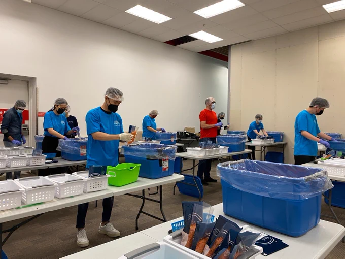 QuadReal interns in Toronto volunteering at Global Medic