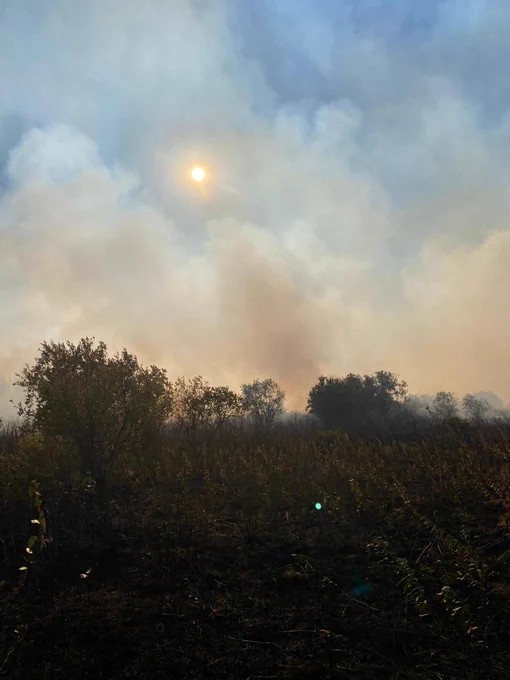 Smokey Sky over a burned prairie.