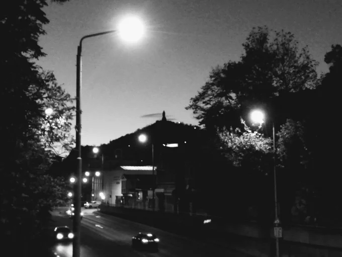 A black and white photograph of the city of Plovdiv, Bulgaria at night.