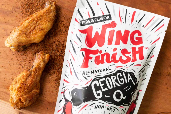 BBQ spice on chicken wings, next to Fire & Flavor Georgia Q Wing Finish