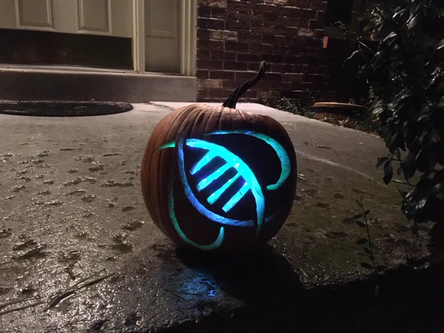 RNAissance Ag logo carved on a jack-o-lantern