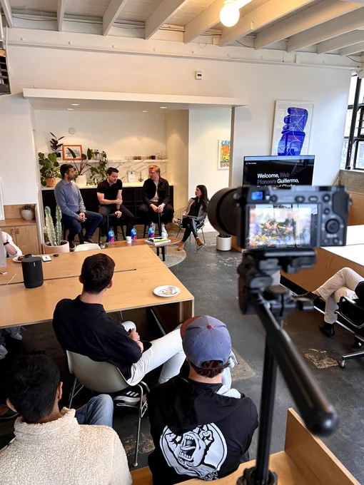 behind the scenes angle of a panel filled with leaders in web technology