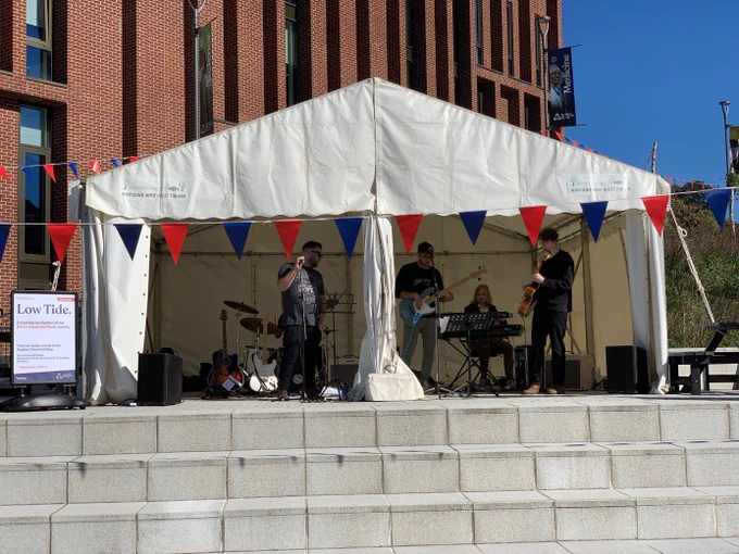 Photo of Low Tide - a band formed by graduates of Commercial Music course performing at the last open day.