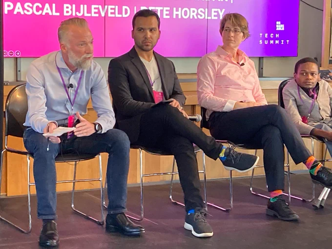 Photograph of the panel discussion on the global state of disability tech.  With Pascal Bijleveld, Varun Chandak, Cathy Holloway, Bernard Chiira, Ravi Narayan, Pete Horsley