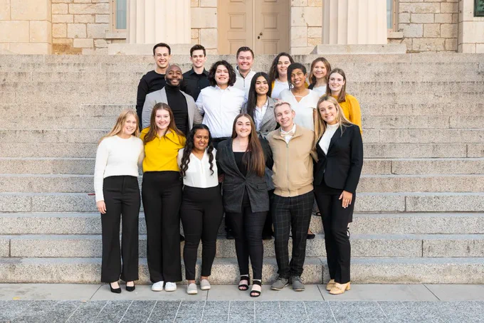 [ID. Photo of the Homecoming Council on the steps of the Old Capitol. End ID]
