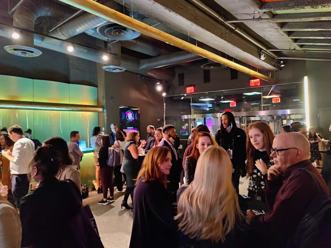 Capacity Interactive Boot Camp's evening reception, filled with people in conversation