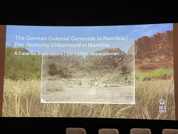 Powerpointfolie mit Titel der Konferenz: The German Colonial Genocide in Namibia
A Case for Reparations/ Der deutsche Völkermord in Namibia
Ein Fall für Reparationen