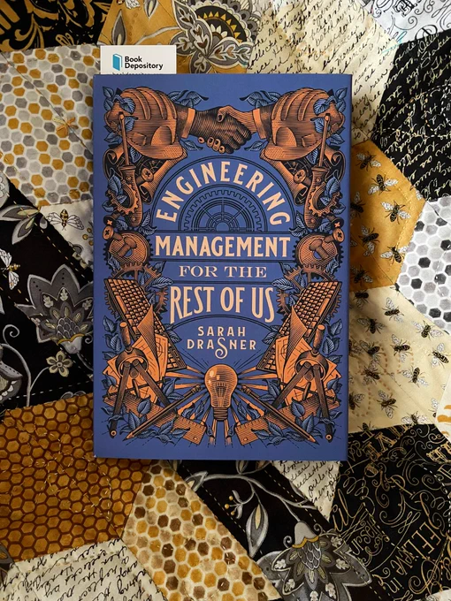 The book, Engineering Management for the Rest of Us, by Sarah Drasner, against my beehive quilt.