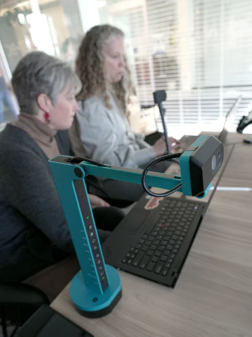 Naomi and Kim testing a document camera