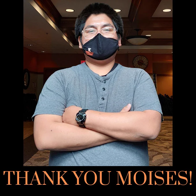 Reads: Thank you Moises! with photo of young man with arms crossed wearing a face mask and glasses.