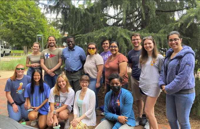Photo of the group, outside on a sunny day at UVA.  