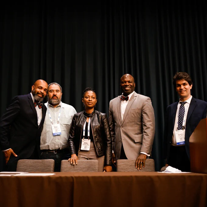 Guest speakers pose for a photo after the session