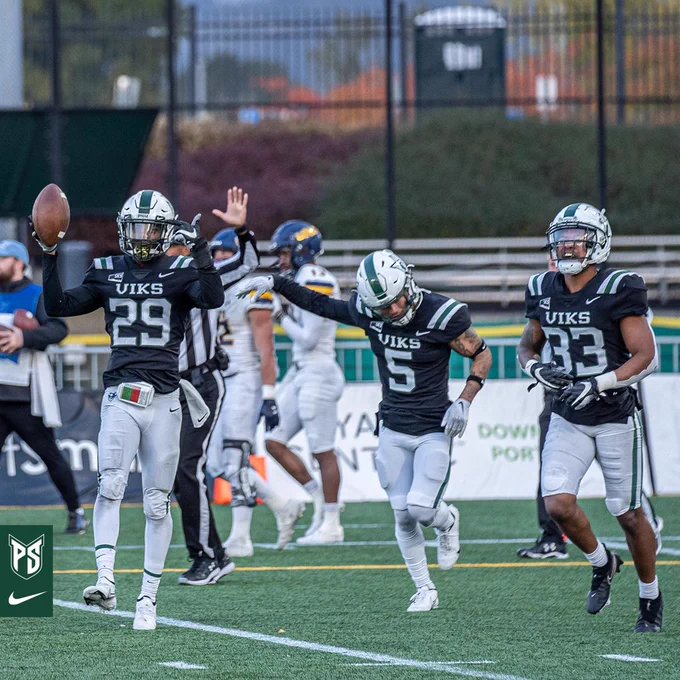 Michael Jackson and his teammates celebrate his INT.