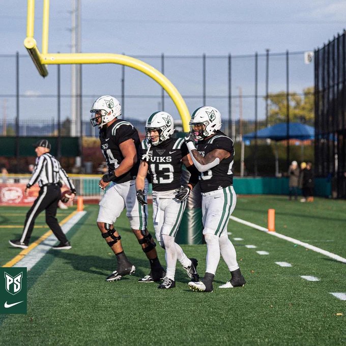 Tyson Pauling, Beau Kelly, Jobi Malary celebrate a TD.
