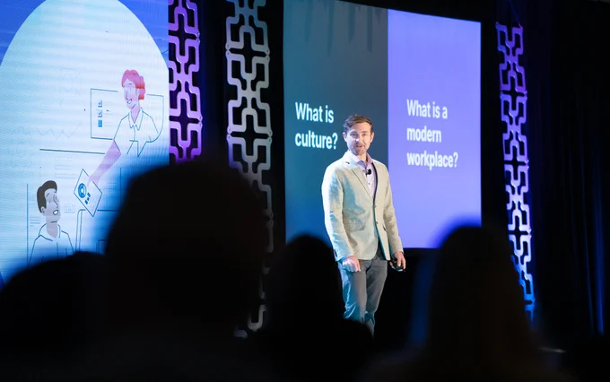 Darren Murph speaking on GitLab TeamOps at WorkSpaces 2022 in California