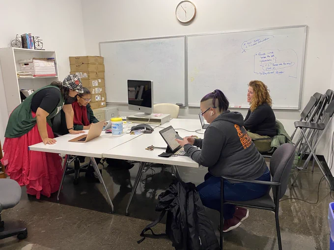 Volunteers making phone calls for Prop J