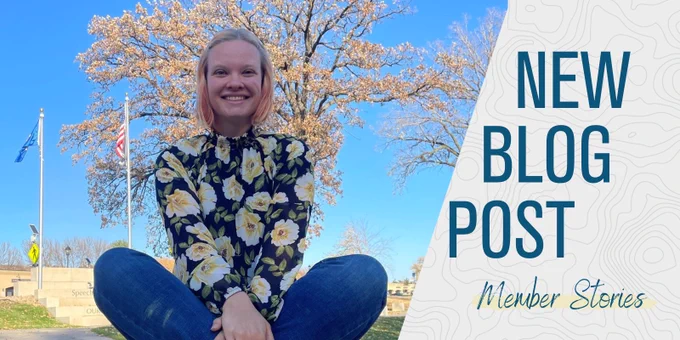 Text: "New Blog Post - Member Stories" with photo of person sitting crossed legged.