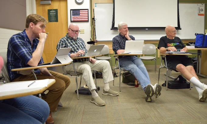 Veterans participating in the writing workshop.