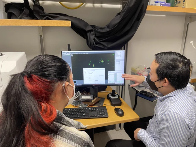 Yvette Morales and Anh Truong going over image analysis and segmentation using Gen5 on the Cytation10