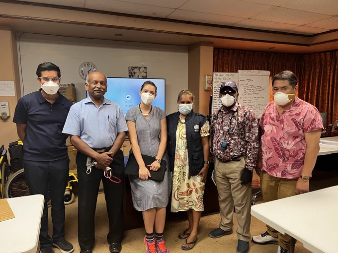GOARN expert Darius Beh and COVID-19 team members with representatives from WHO and the Pacific Island Health Officers Association in the Federated States of Micronesia 