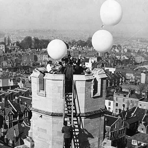 Cecil Powell and balloons on University of Bristol Physics building, 1950 (DM1137/A125)