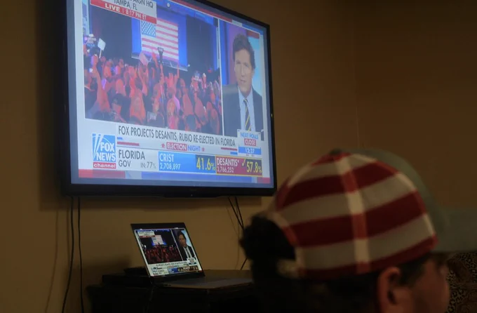 Students in Allen Spivey dormitory react to the election results broadcasted from national television outlets. (Salvatore Ambrosino / The Southern)