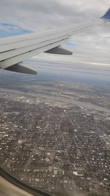 View from plane window showing St. Louis metro area