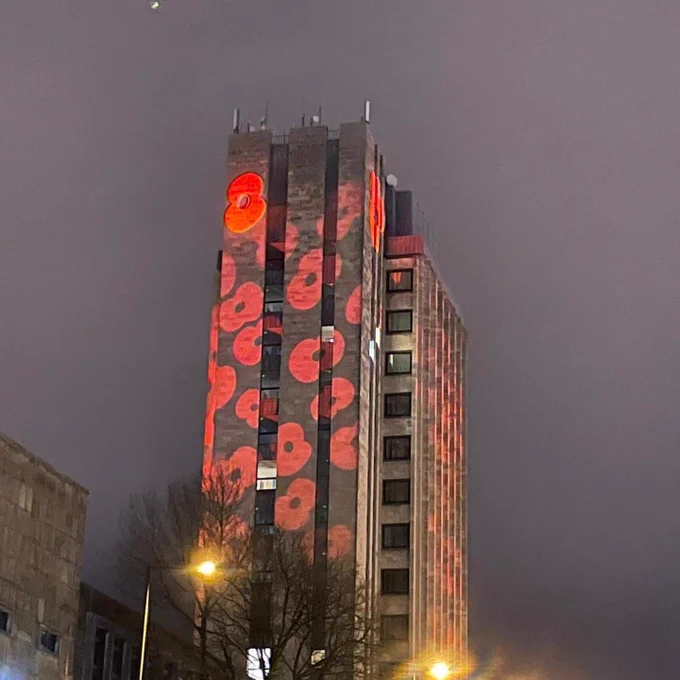 Oldham’s Civic Centre tower is lit with poppies